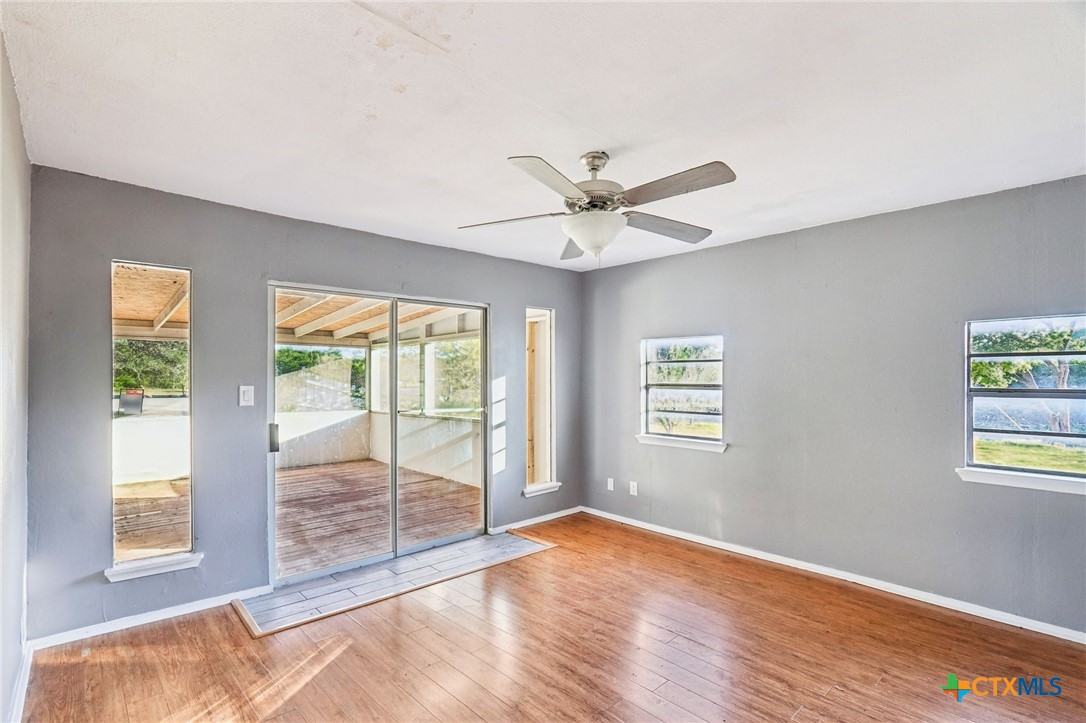24007 Windy Valley Road Leander, TX 78641 - Photo 6 of 24 a view of an empty room with a window