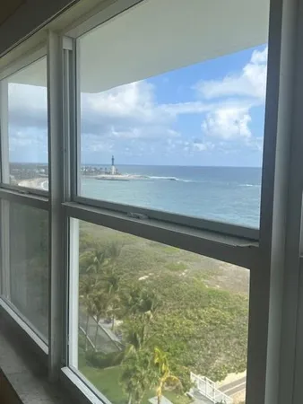a view of ocean from a window