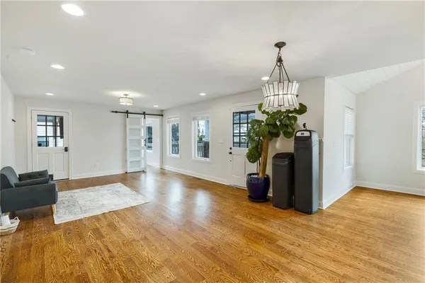 a view of a living room and kitchen