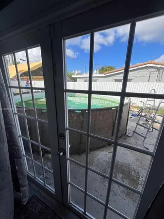 a view of a glass door with a glass door