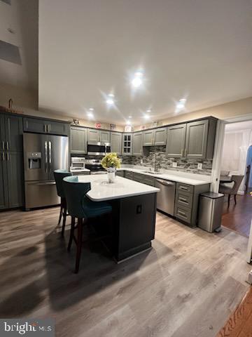 3300 Spriggs Request Way Bowie, MD 20721 - Photo 15 of 17 a kitchen with a sink stainless steel appliances and cabinets