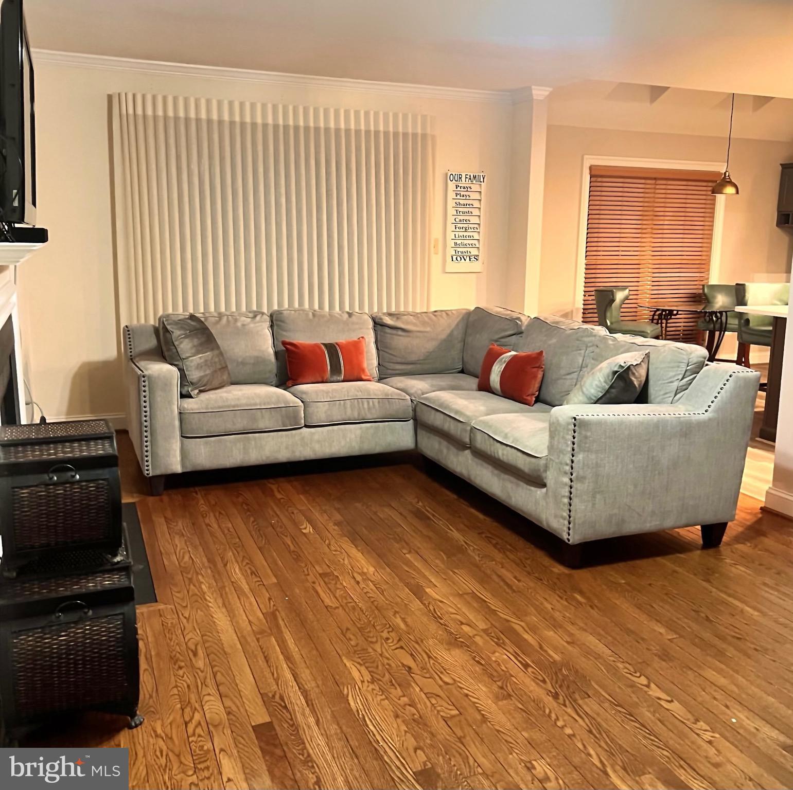 3300 Spriggs Request Way Bowie, MD 20721 - Photo 5 of 17 a living room with furniture and a large window