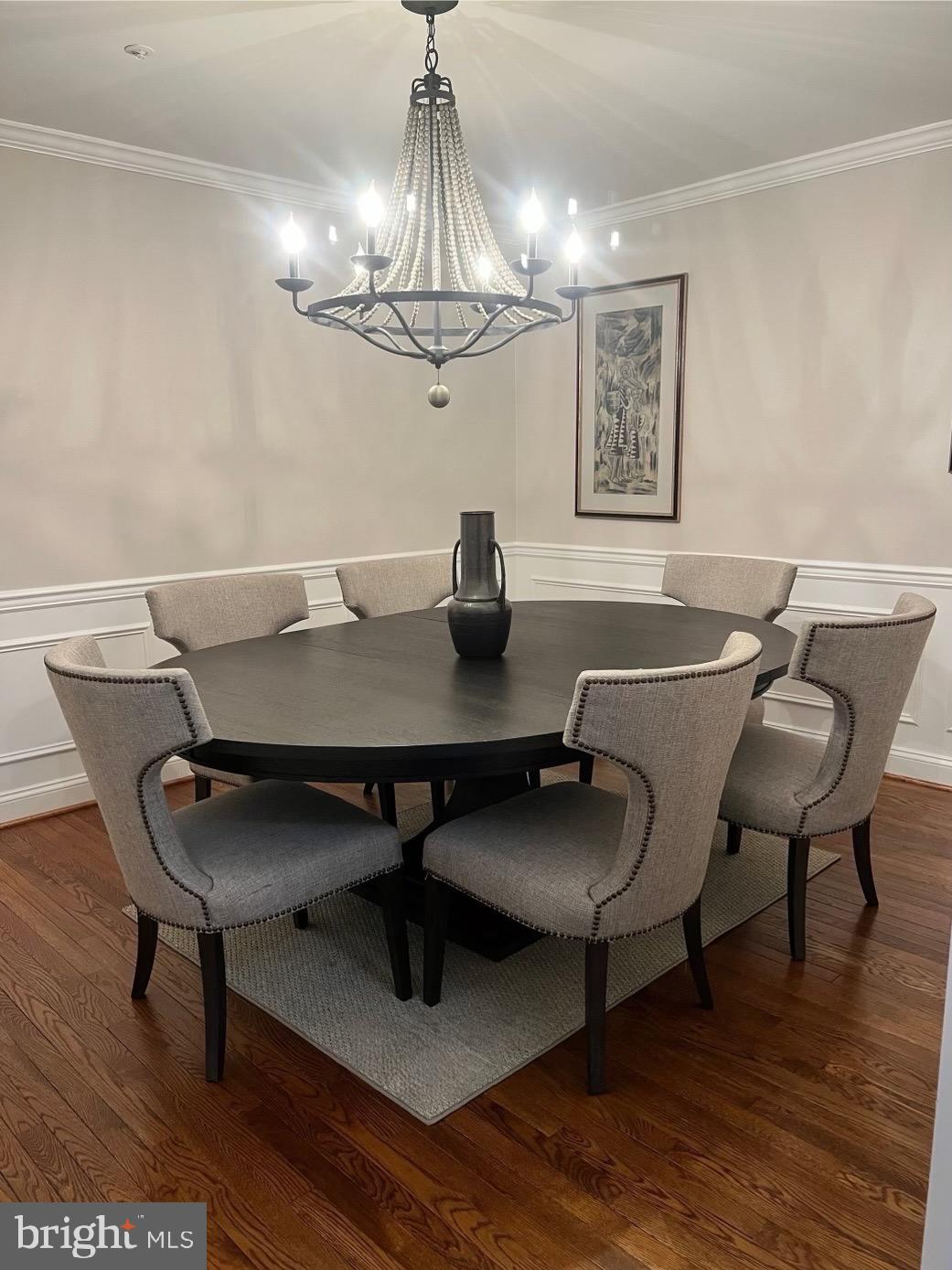3300 Spriggs Request Way Bowie, MD 20721 - Photo 7 of 17 a view of a dining room with furniture and chandelier
