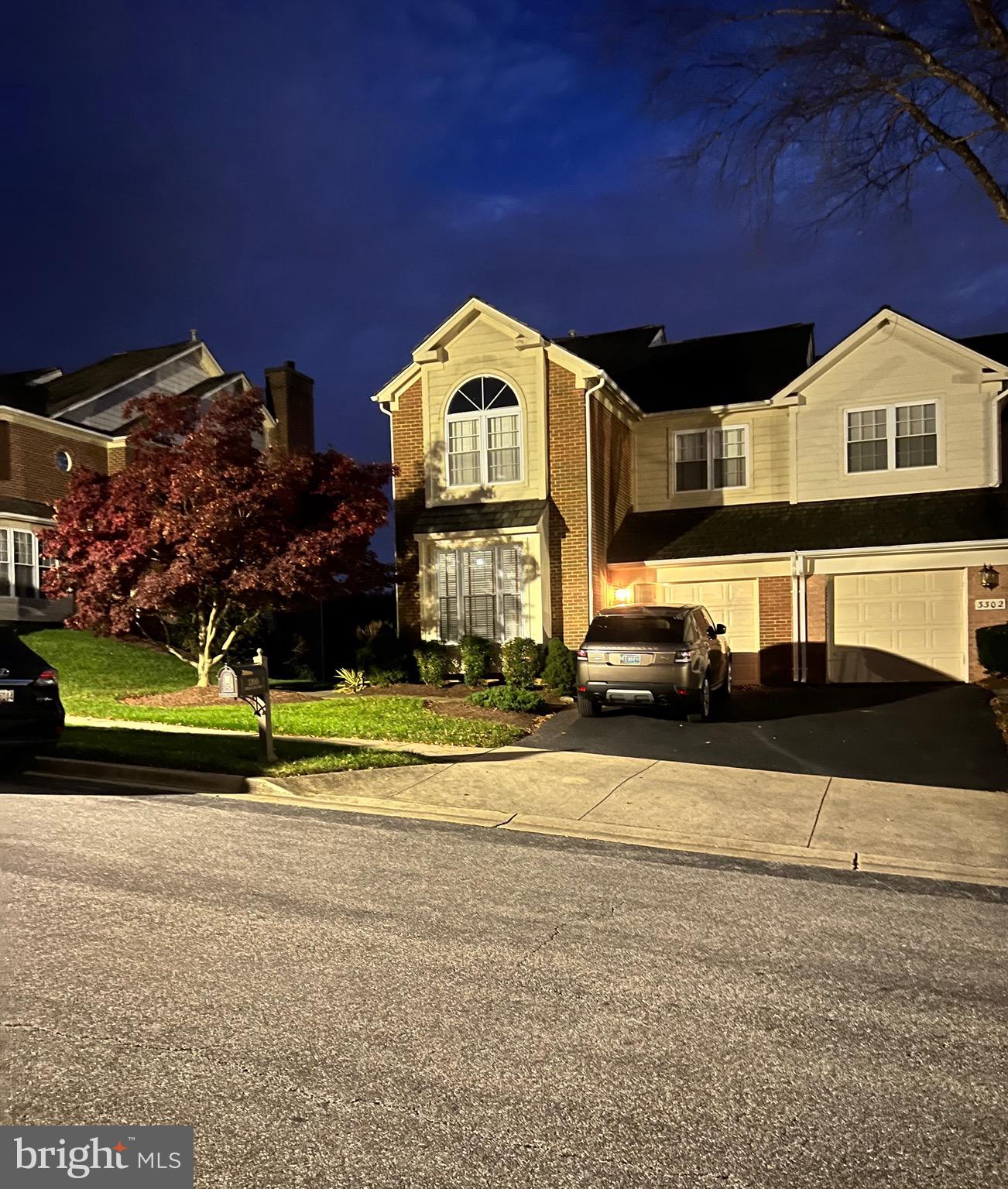 3300 Spriggs Request Way Bowie, MD 20721 - Photo 10 of 17 a front view of a house with a yard
