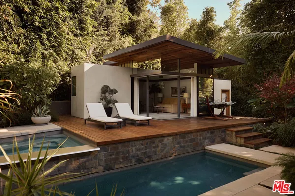 a outdoor dining space with furniture and outdoor view
