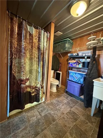 a view of porch with wooden floor in outdoor space
