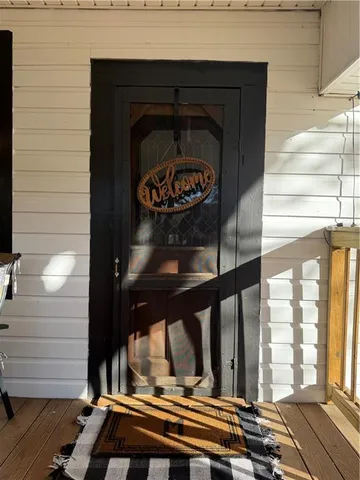 a closeup of a door with wooden floor