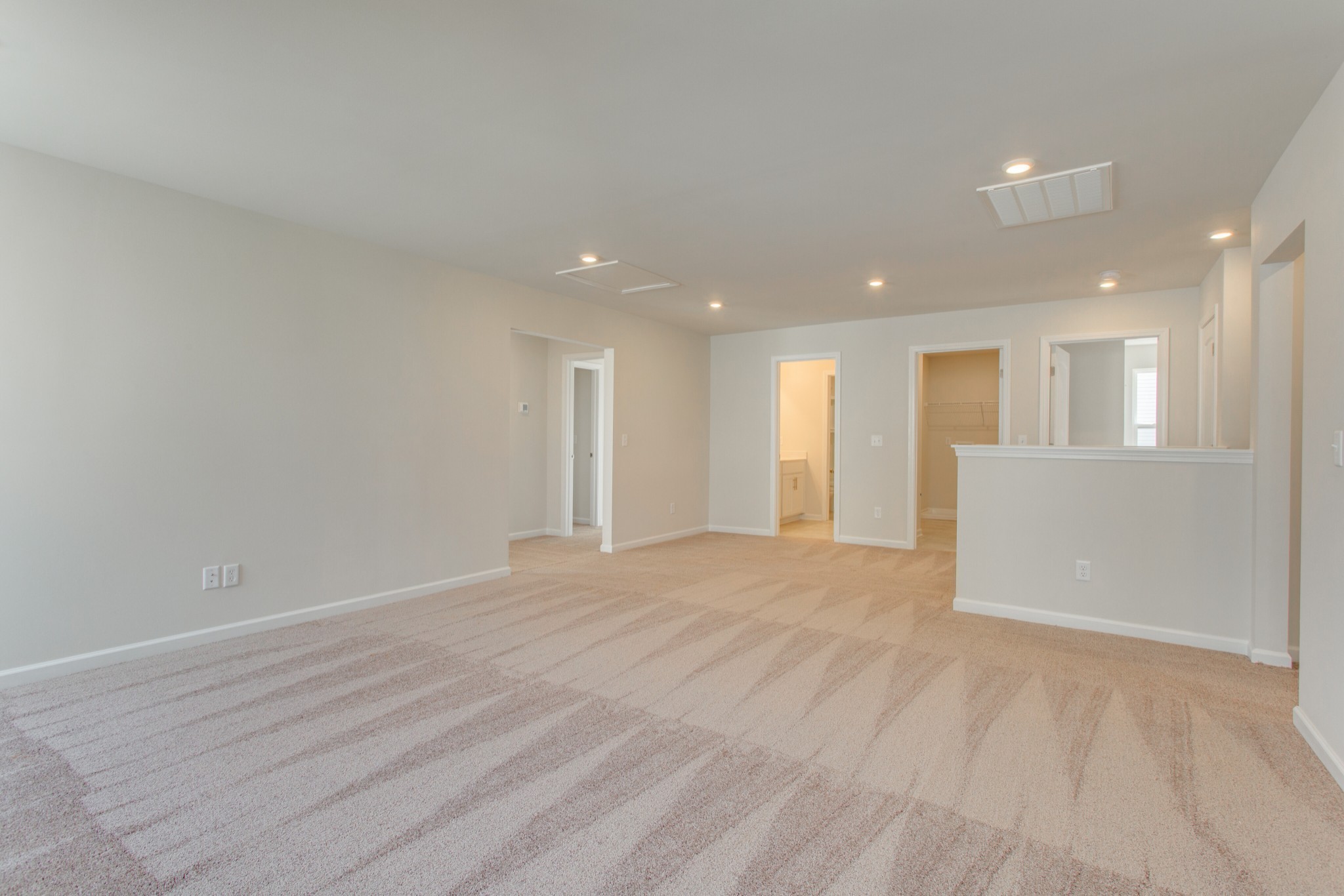 4111 Dwight Way Murfreesboro, TN 37128 - Photo 21 of 28 a view of an empty room with wooden floor and kitchen