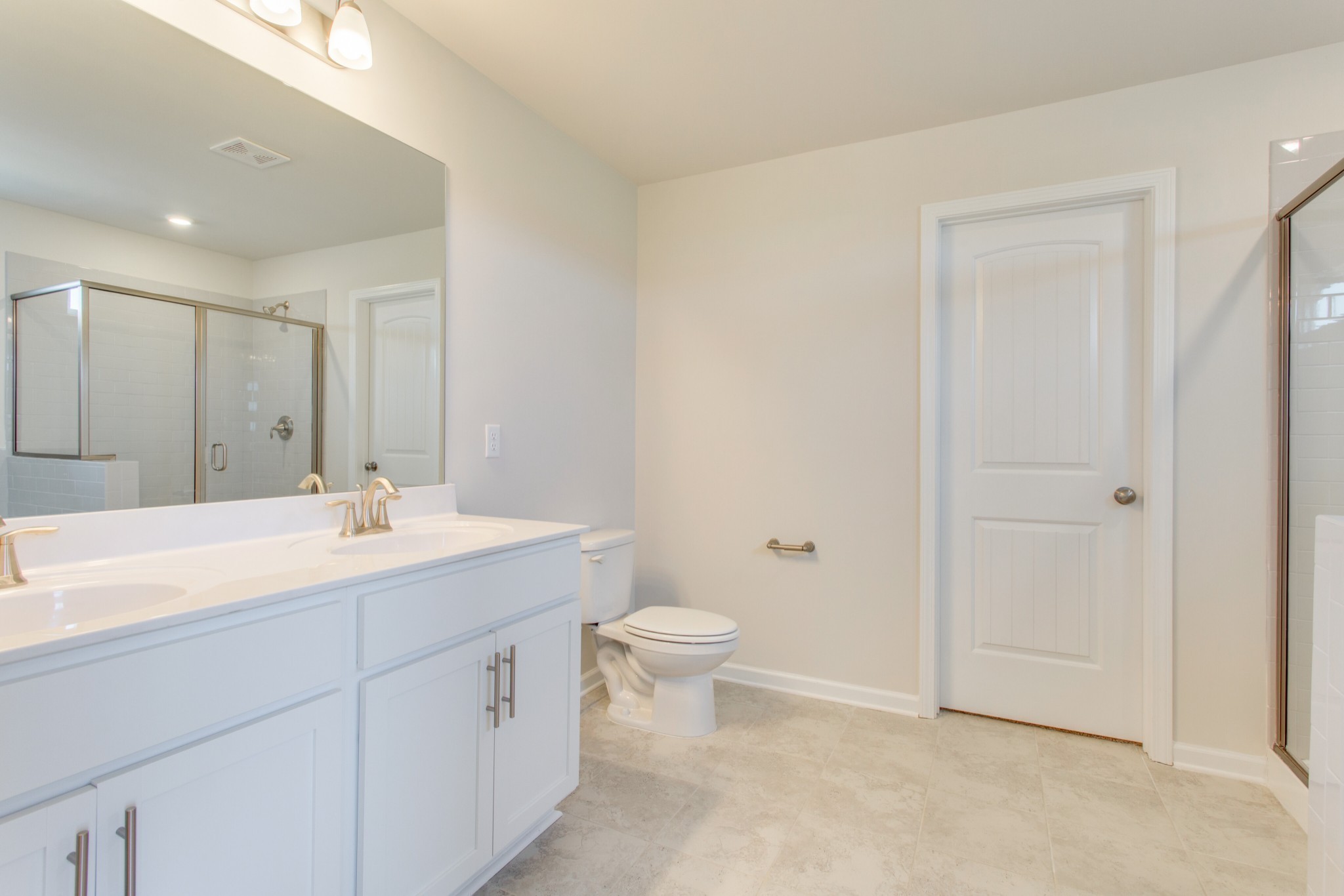 4111 Dwight Way Murfreesboro, TN 37128 - Photo 24 of 28 a bathroom with a sink a toilet and a large mirror