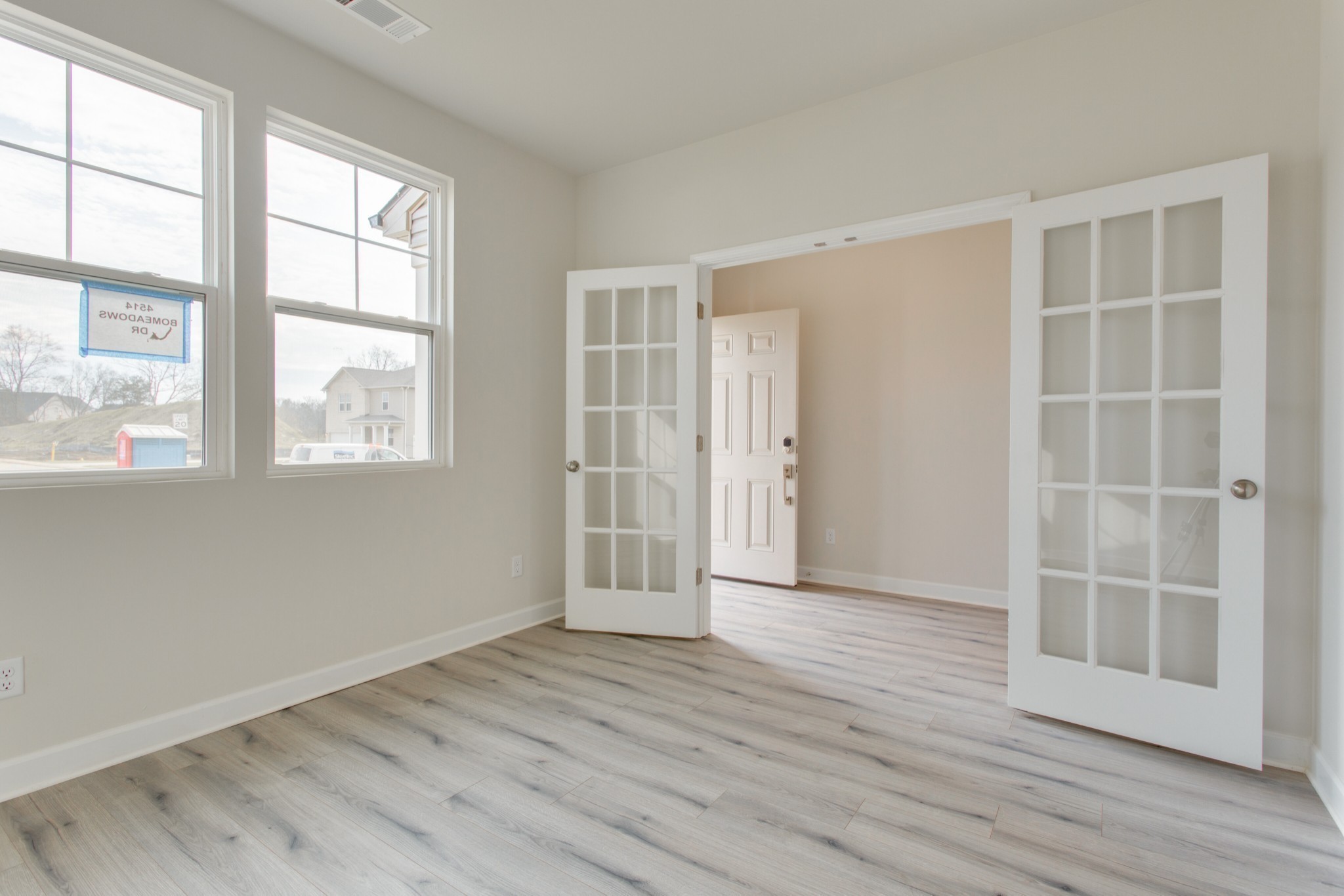 4111 Dwight Way Murfreesboro, TN 37128 - Photo 7 of 28 an empty room with wooden floor and windows