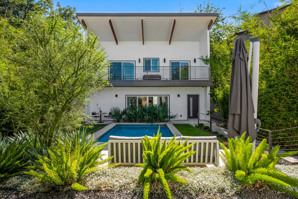 2705 Lyons Road Austin, TX 78702 - Photo 1 of 1 a view of a house with backyard and sitting area