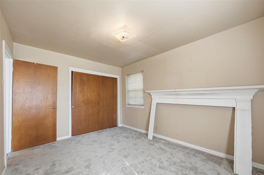206 West Ridgewood Drive Garland, TX 75041 - Photo 12 of 21 a view of an empty room and closet area