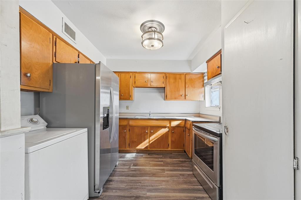 206 West Ridgewood Drive Garland, TX 75041 - Photo 3 of 21 a view of storage and utility