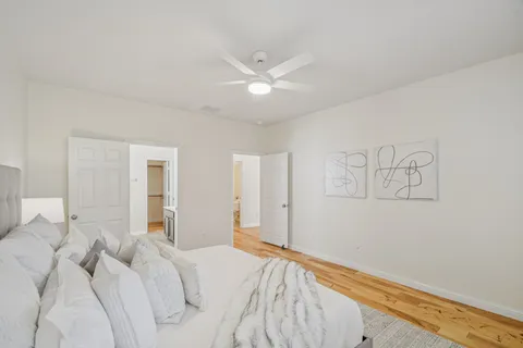 a bathroom with a sink a large mirror and a shower