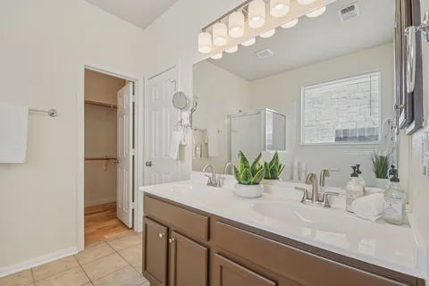 a view of an empty walk in closet