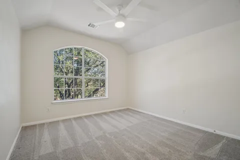 a bathroom with a sink a large mirror and a shower