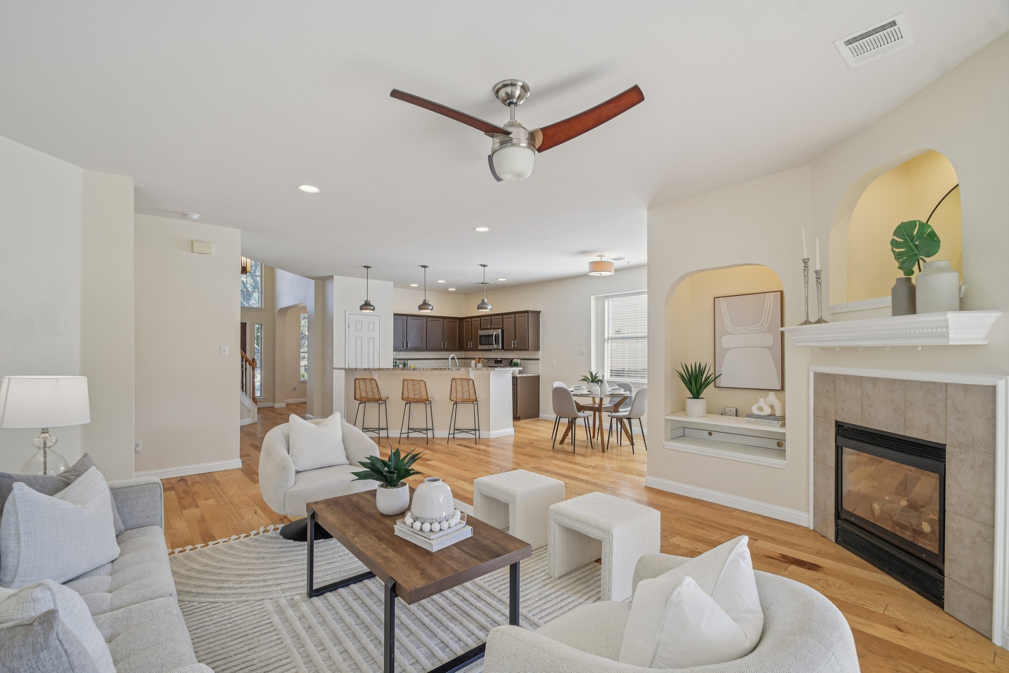 5947 Lomita Verde Circle Austin, TX 78749 - Photo 7 of 40 a living room with furniture a fireplace and a table