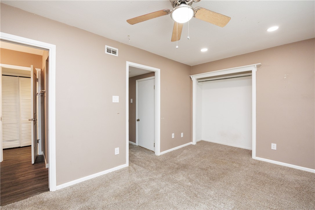 320 Long Point Drive Portland, TX 78374 - Photo 31 of 40 Carpeted room with neutral wall tones and a ceilin