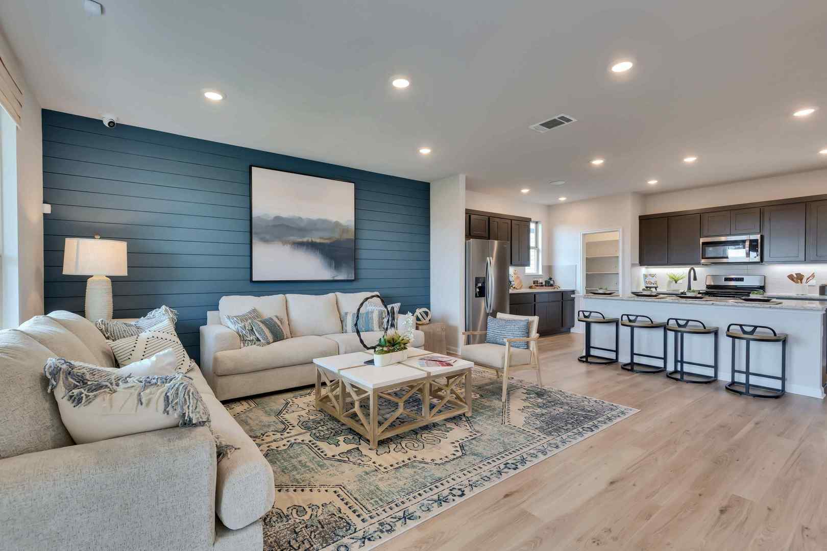 1205 Lavender Way Georgetown, TX 78628 - Photo 14 of 14 An open floorplan seamlessly connects the inviting living area with a contemporary kitchen, perfect for entertaining.