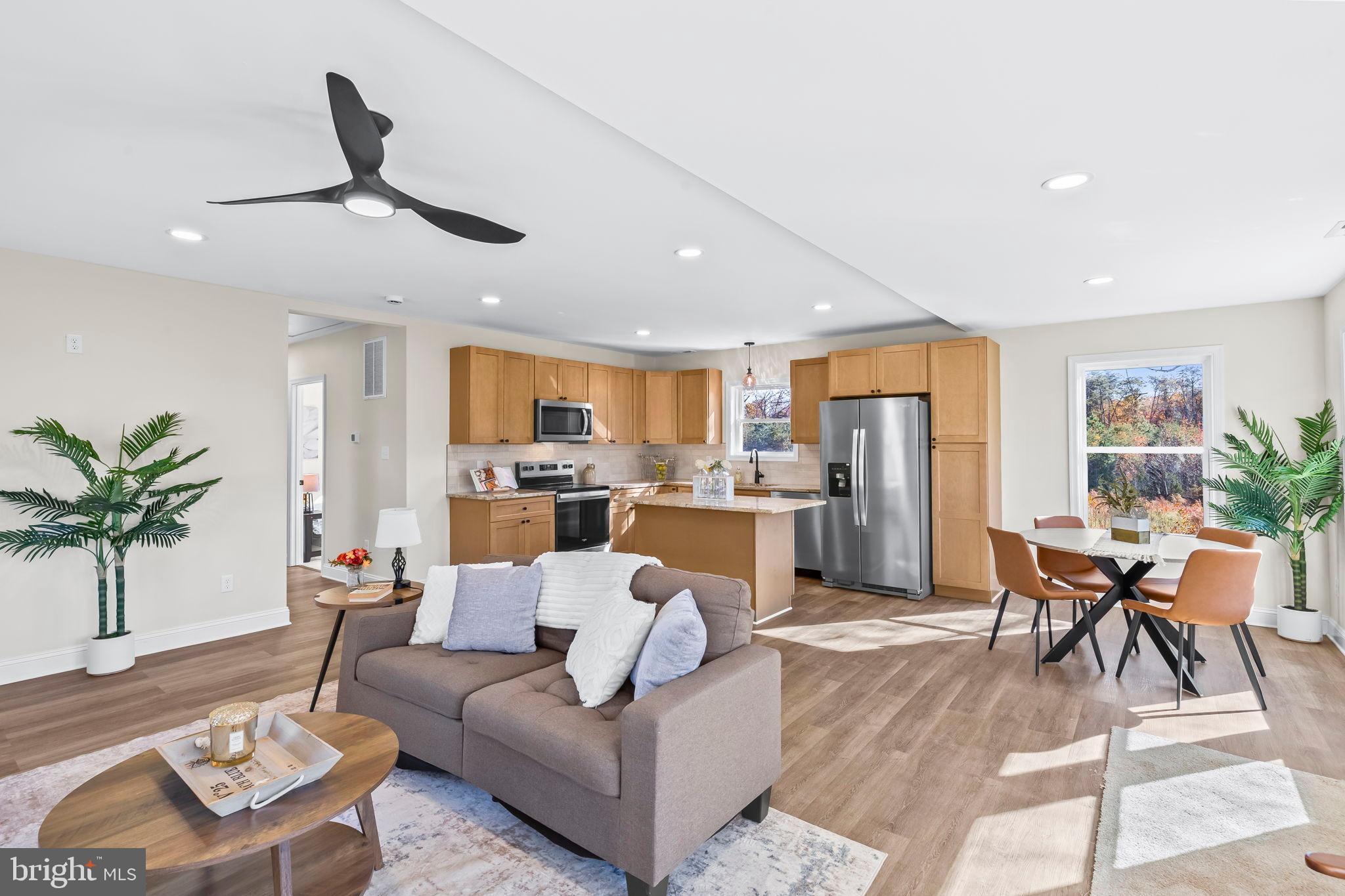 1710 Old Adelina Road Prince Frederick, MD 20678 - Photo 1 of 38 Bright and airy open-concept living space.