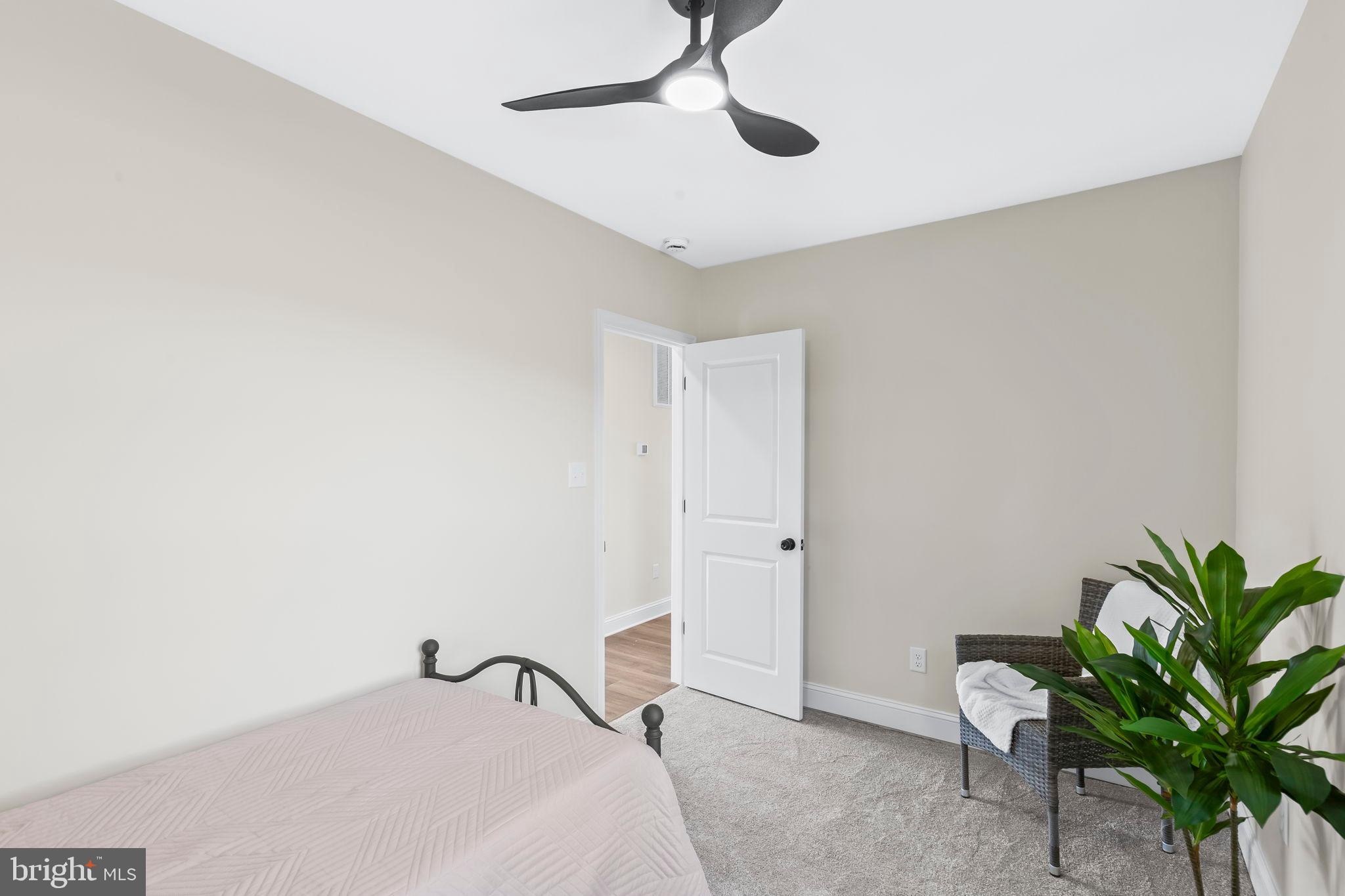 1710 Old Adelina Road Prince Frederick, MD 20678 - Photo 13 of 38 Bright and airy bedroom with modern touches.