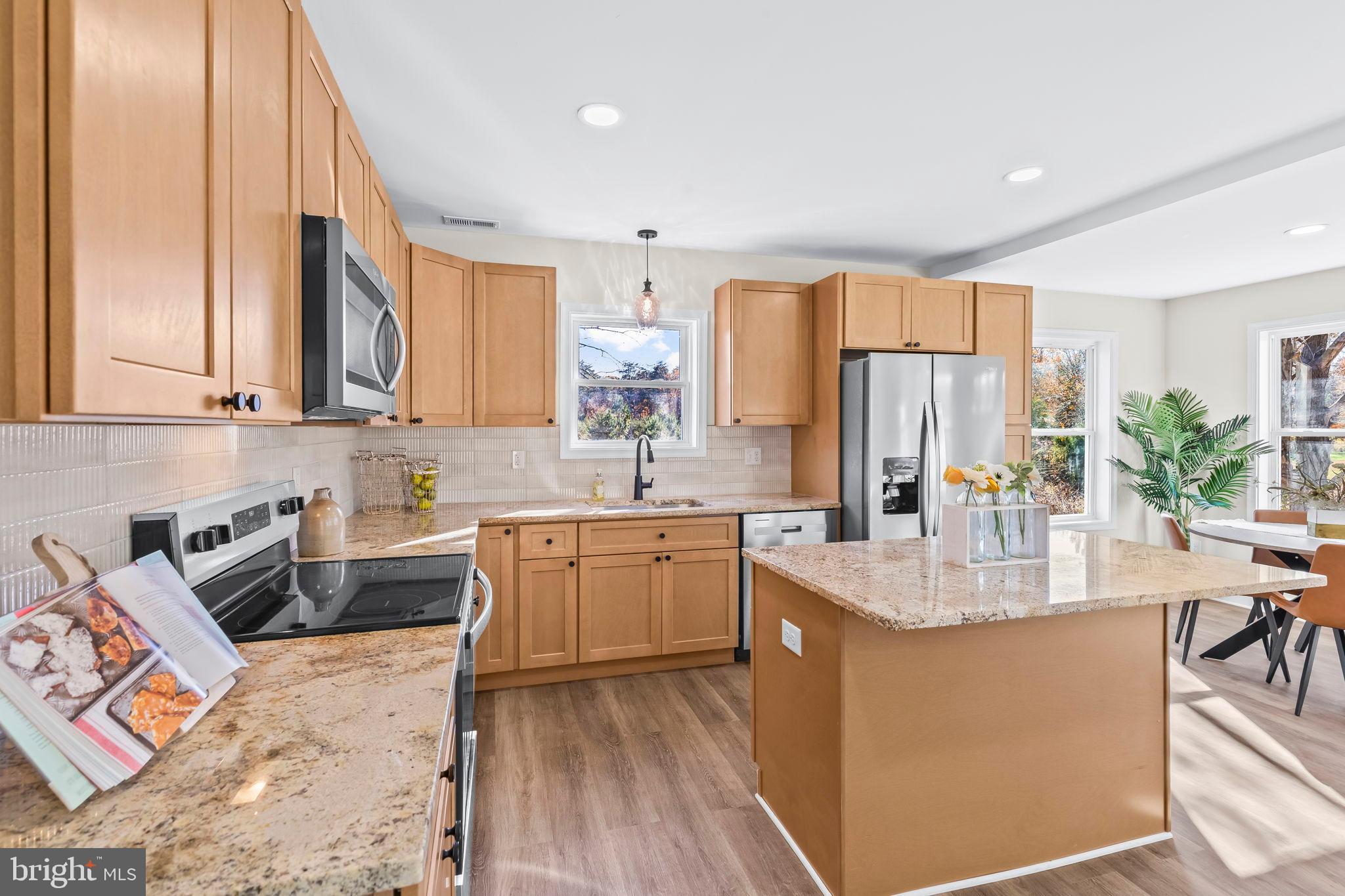 1710 Old Adelina Road Prince Frederick, MD 20678 - Photo 3 of 38 Bright and inviting modern kitchen space.