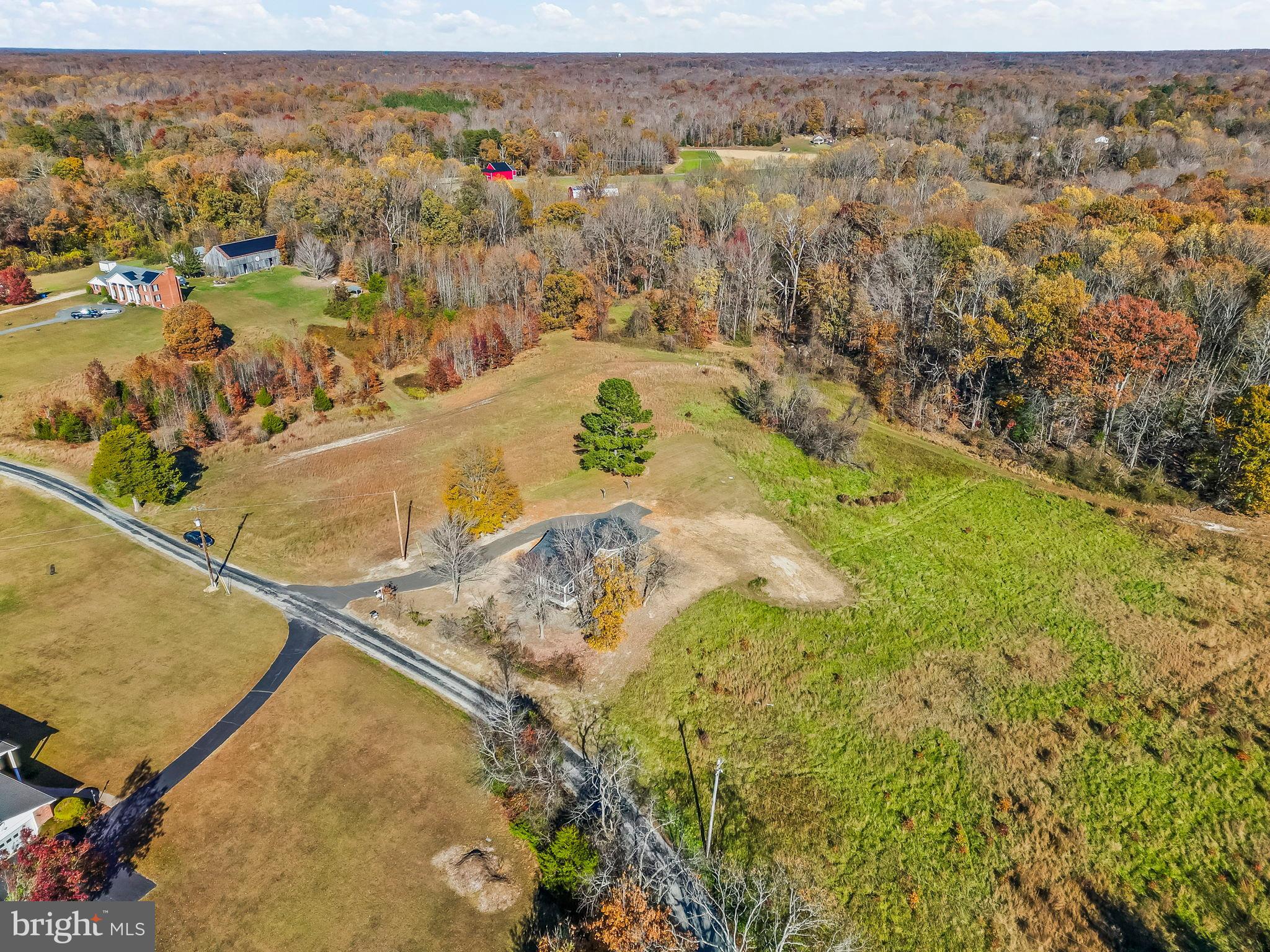 1710 Old Adelina Road Prince Frederick, MD 20678 - Photo 35 of 38 Scenic autumn landscape with open fields.