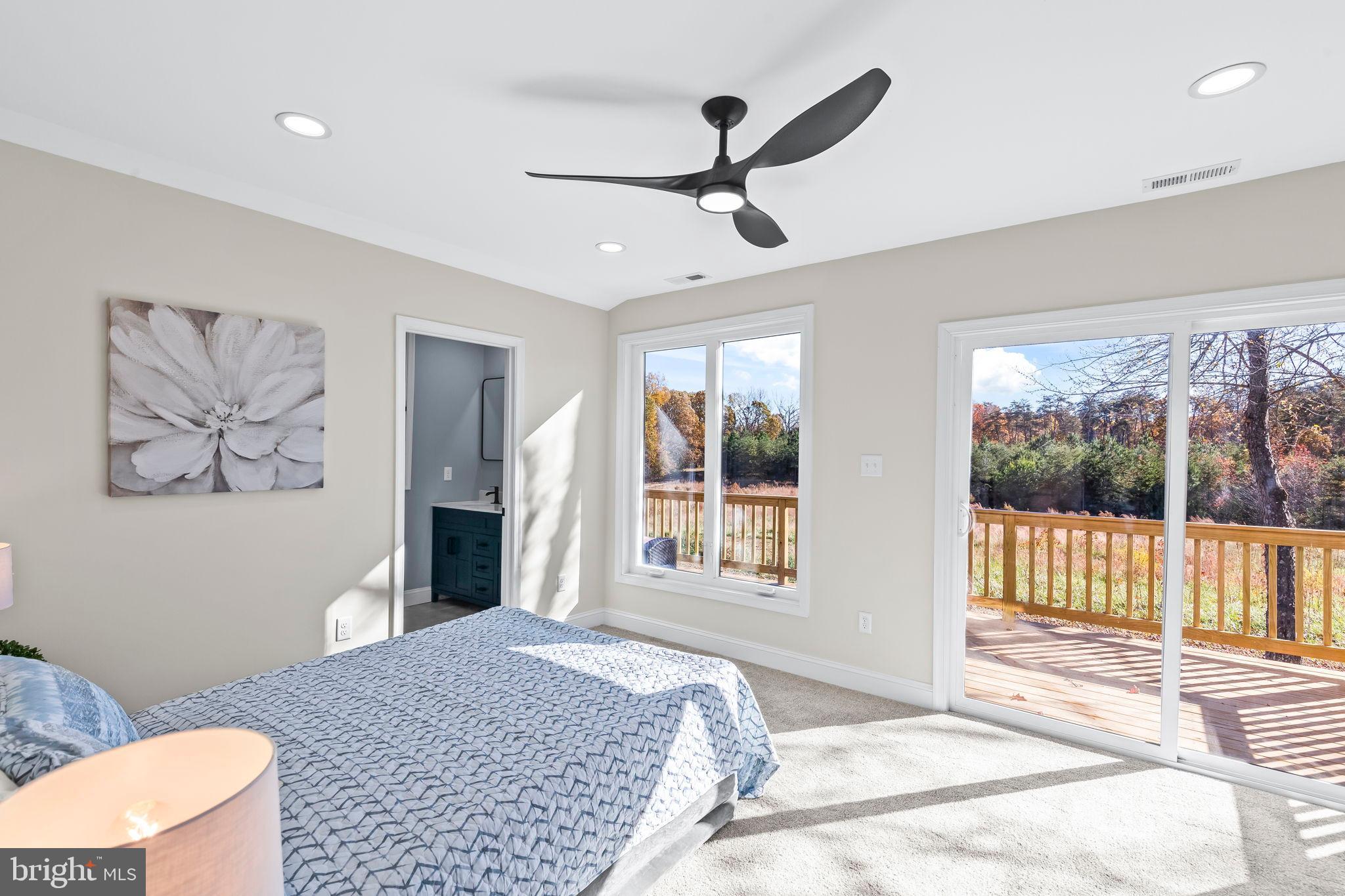 1710 Old Adelina Road Prince Frederick, MD 20678 - Photo 6 of 38 Bright and airy bedroom with scenic views.