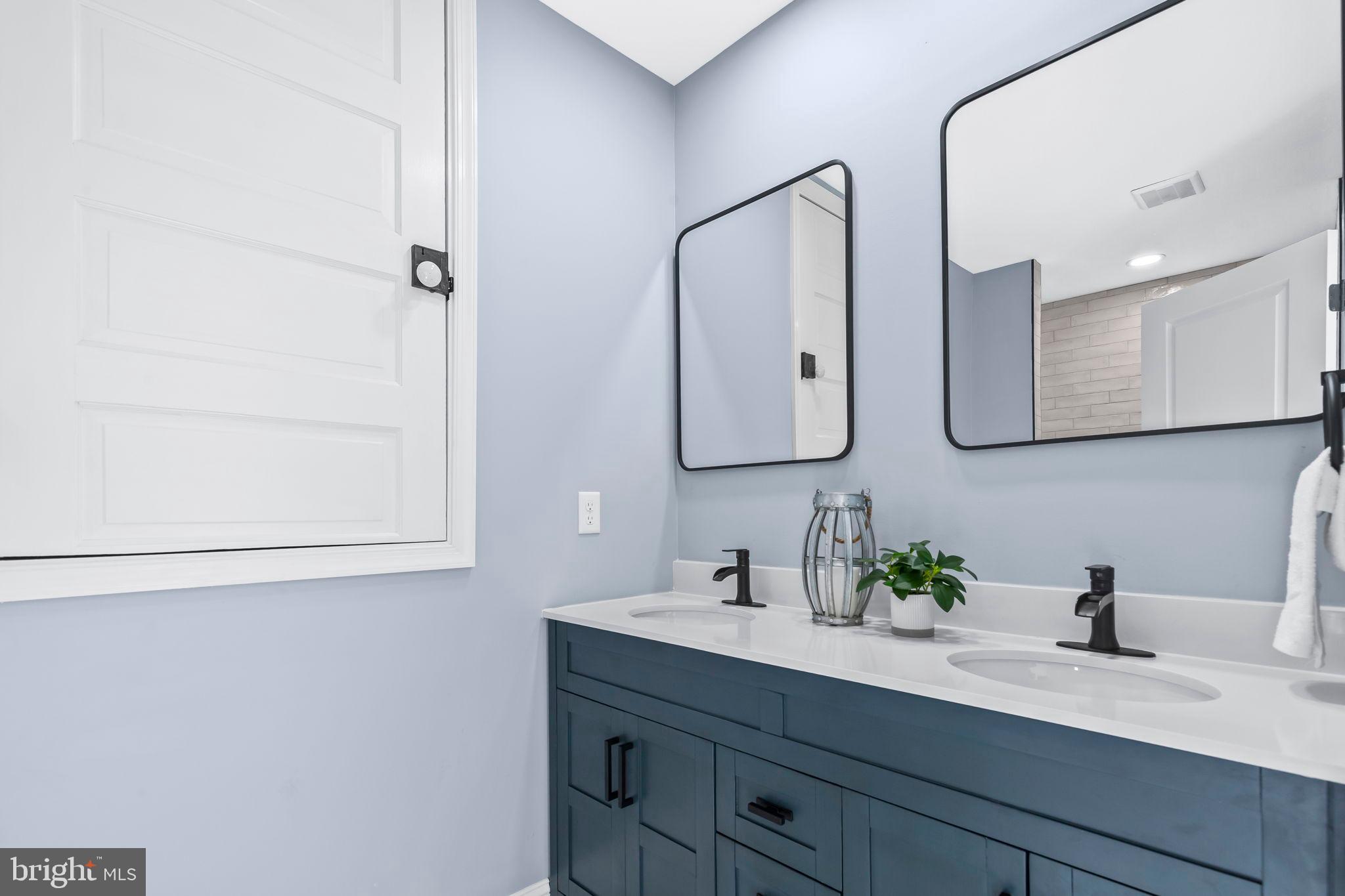 1710 Old Adelina Road Prince Frederick, MD 20678 - Photo 9 of 38 Sleek modern bathroom with stylish accents.