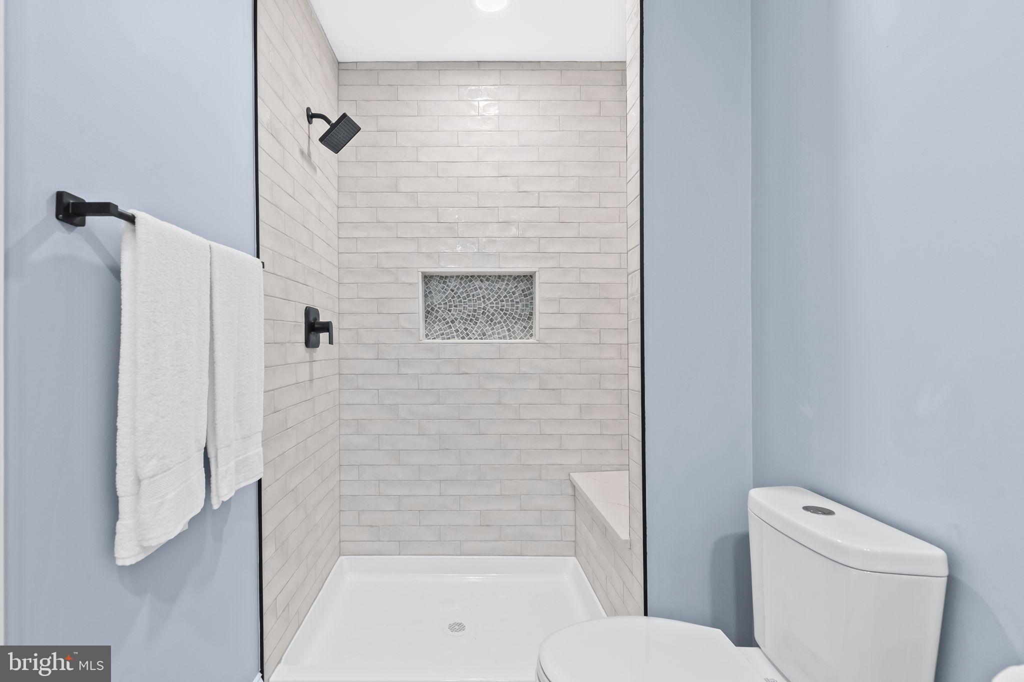 1710 Old Adelina Road Prince Frederick, MD 20678 - Photo 10 of 38 Sleek modern bathroom with elegant finishes.