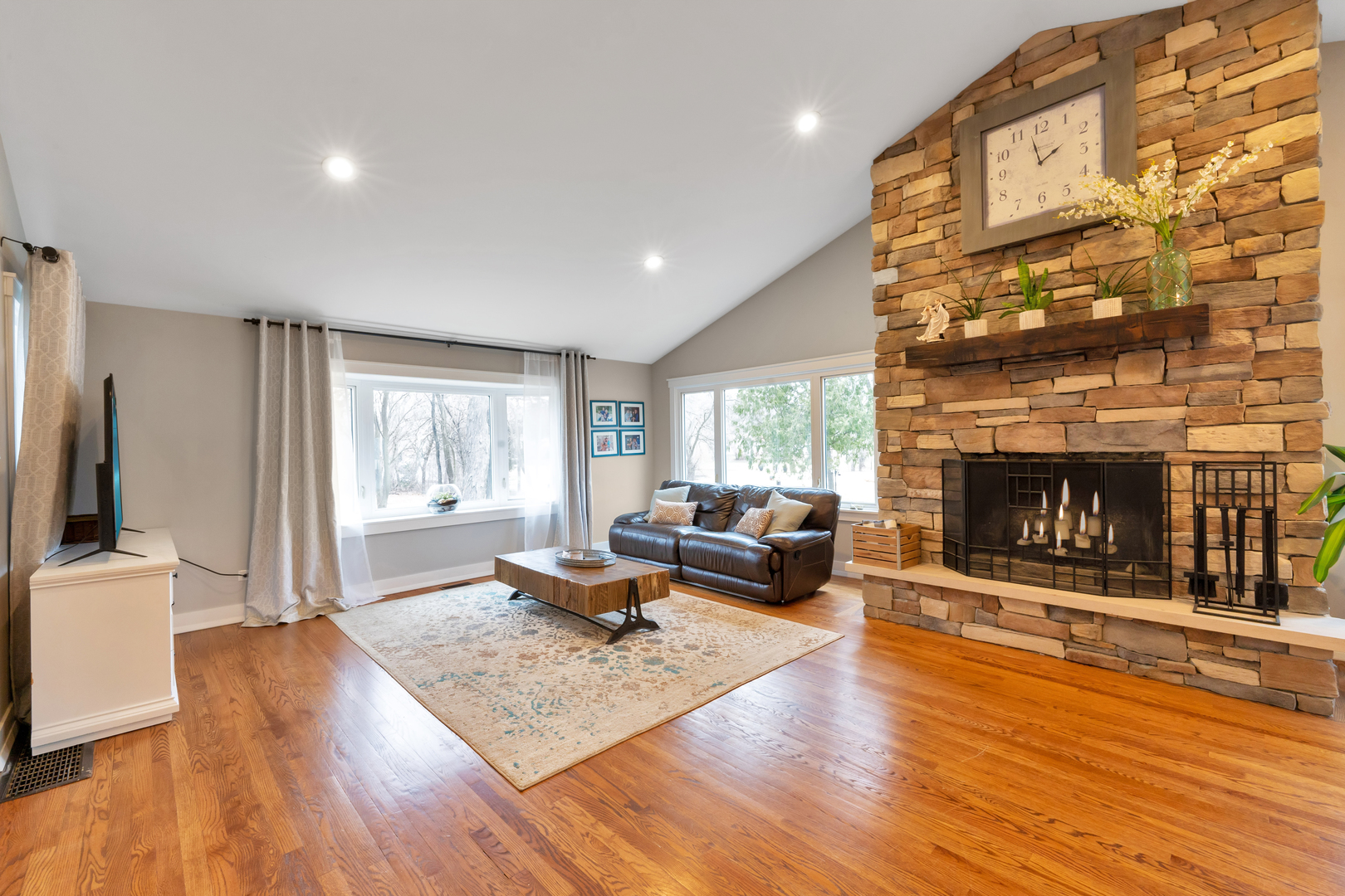 349 Haman Road Inverness, IL 60067 - Photo 13 of 36 a living room with fireplace furniture and a wooden floor