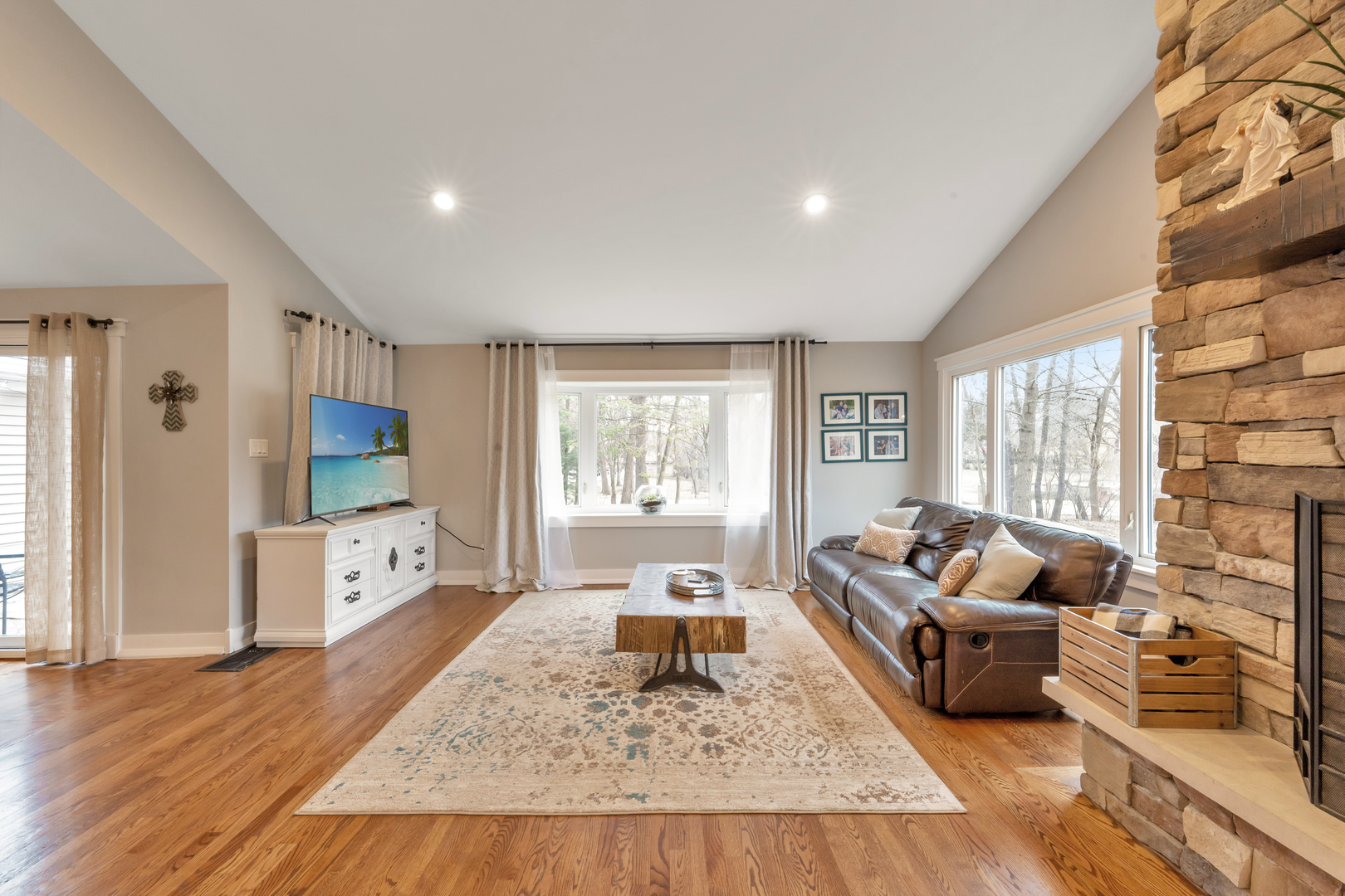 349 Haman Road Inverness, IL 60067 - Photo 14 of 36 a living room with fireplace furniture and a flat screen tv