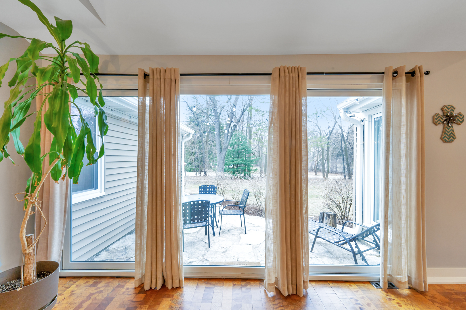 349 Haman Road Inverness, IL 60067 - Photo 16 of 36 a view of a hallway with wooden floor and a potted plant