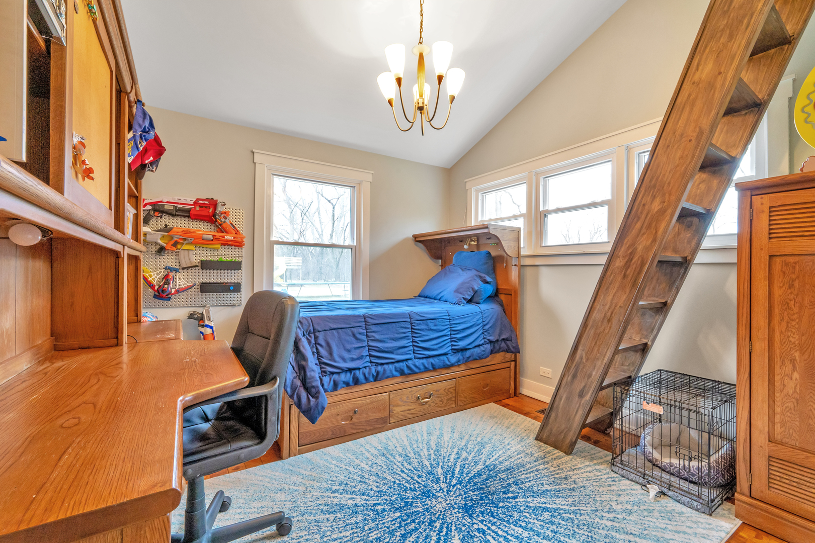 349 Haman Road Inverness, IL 60067 - Photo 25 of 36 a living room with furniture and a chandelier