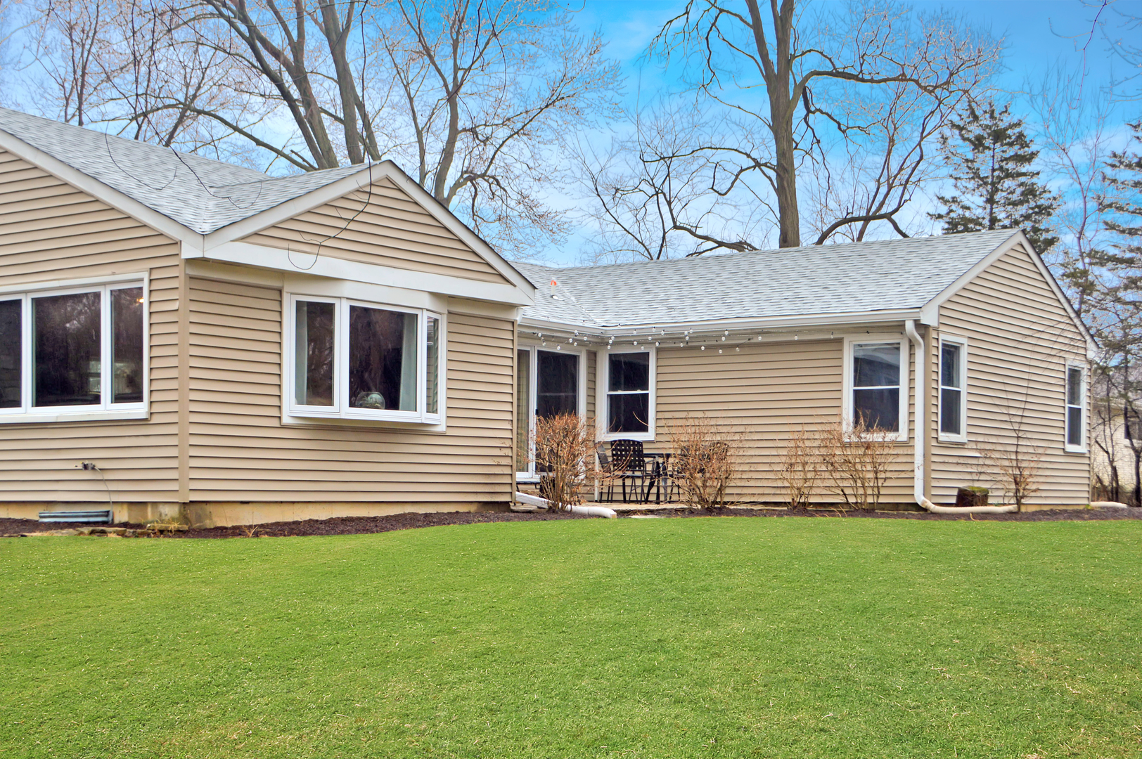 349 Haman Road Inverness, IL 60067 - Photo 3 of 36 a front view of a house with a garden