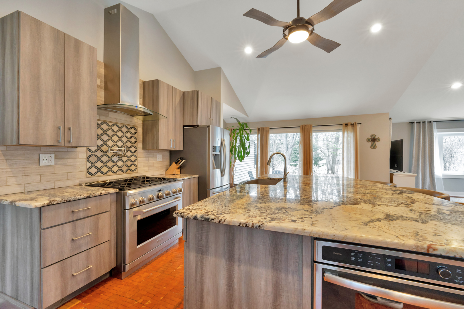 349 Haman Road Inverness, IL 60067 - Photo 6 of 36 a kitchen with granite countertop a sink stainless steel appliances and cabinets