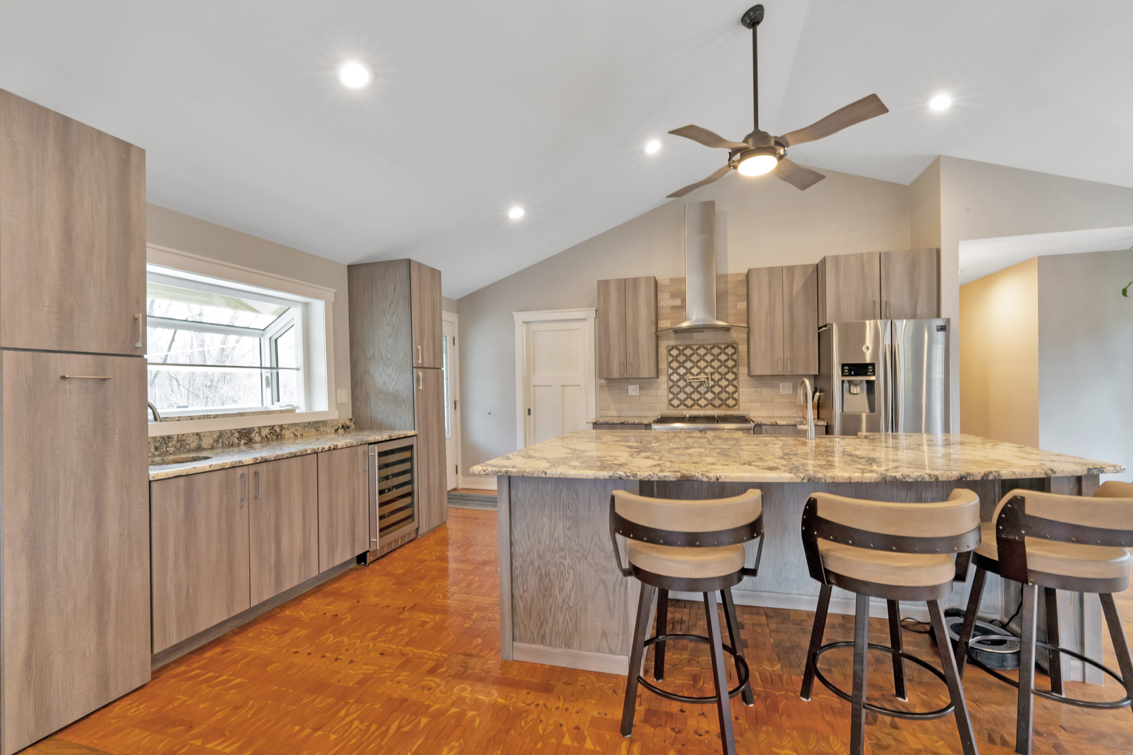 349 Haman Road Inverness, IL 60067 - Photo 9 of 36 a kitchen with granite countertop lots of white cabinets and stainless steel appliances