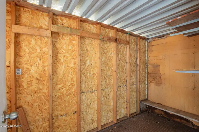 a bathroom with a shower curtain and a shower curtain