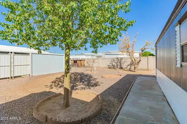 a view of a house with a snow in the yard