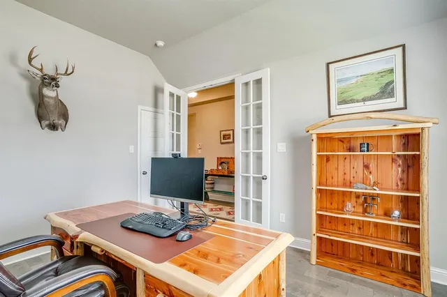 a view of a workspace with furniture