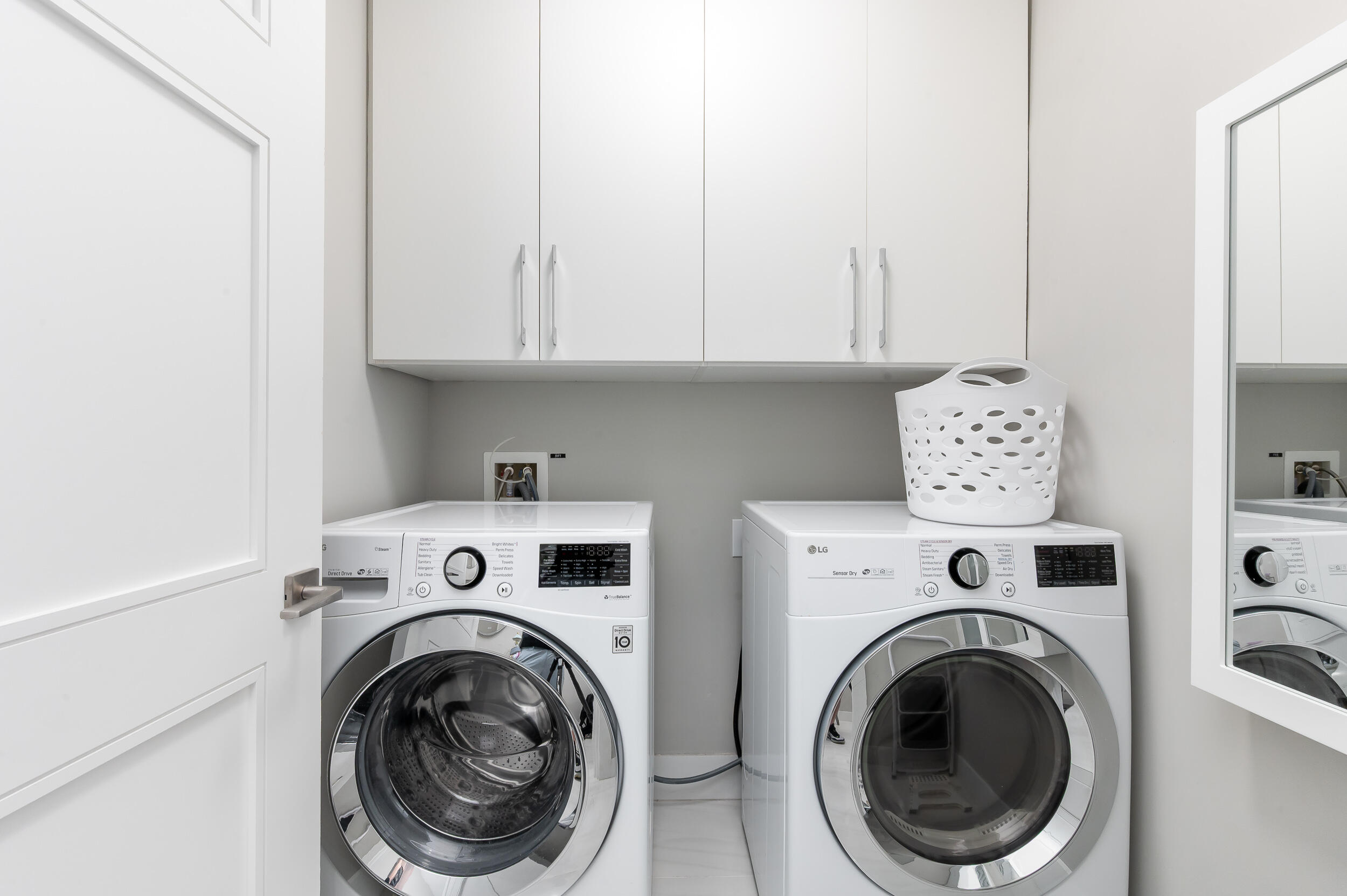 155 East Boca Raton Road, Unit 1107 Boca Raton, FL 33432 - Photo 23 of 53 a view of washer and dryer in a room