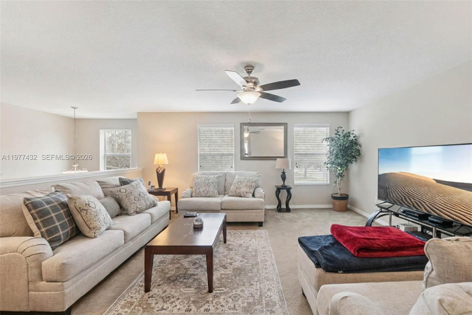 2502 Woodside Ridge Drive Apopka, FL 32712 - Photo 11 of 37 a living room with furniture