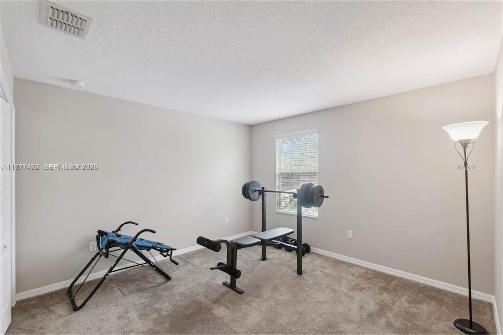 2502 Woodside Ridge Drive Apopka, FL 32712 - Photo 18 of 37 a view of a room with chairs