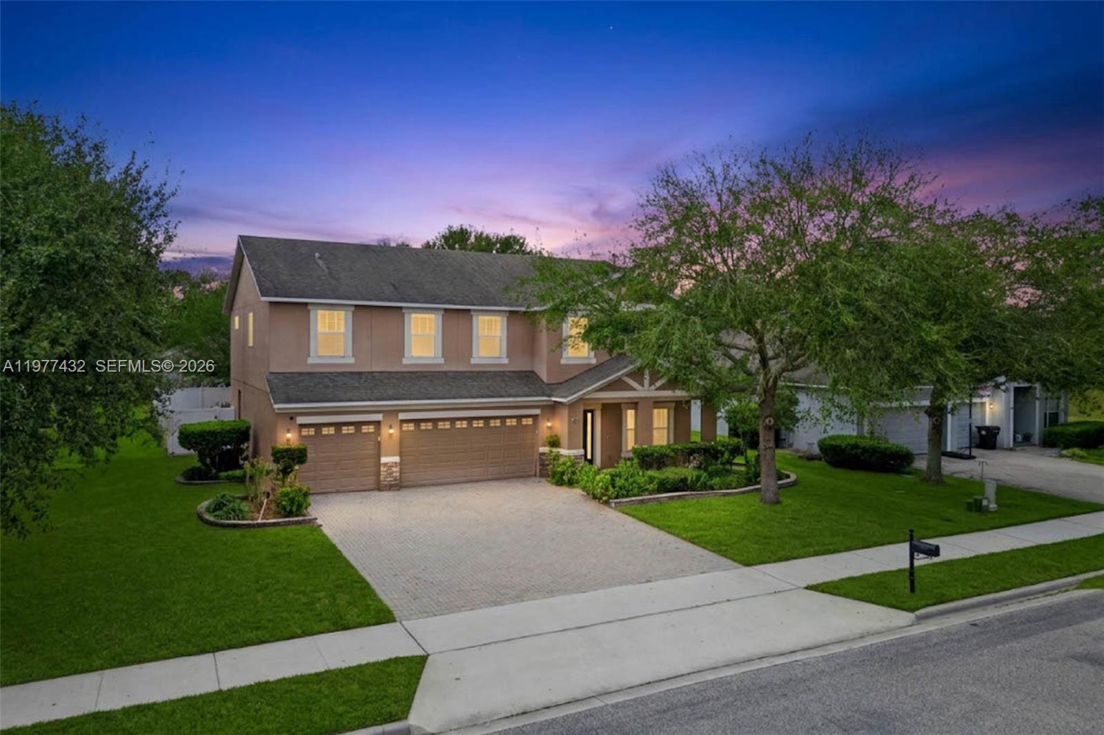 2502 Woodside Ridge Drive Apopka, FL 32712 - Photo 2 of 37 a house view with a garden space