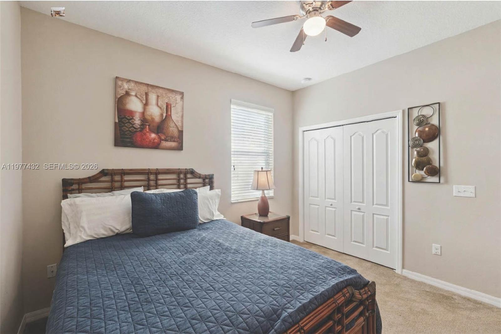 2502 Woodside Ridge Drive Apopka, FL 32712 - Photo 21 of 37 a living room with furniture and a chandelier