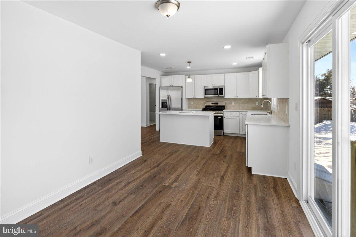 464 Sykesville Road Wrightstown, NJ 08562 - Photo 13 of 32 a view of kitchen with wooden floor