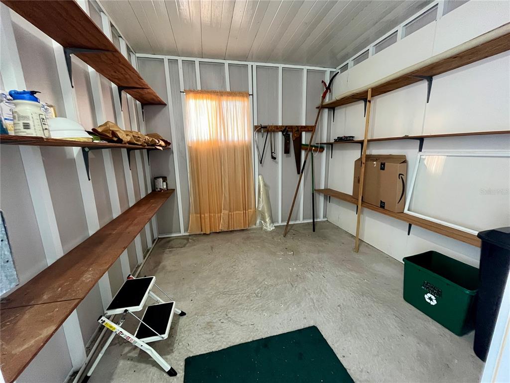 10614 Hayden Avenue New Port Richey, FL 34655 - Photo 21 of 23 a view of a room with gym equipment