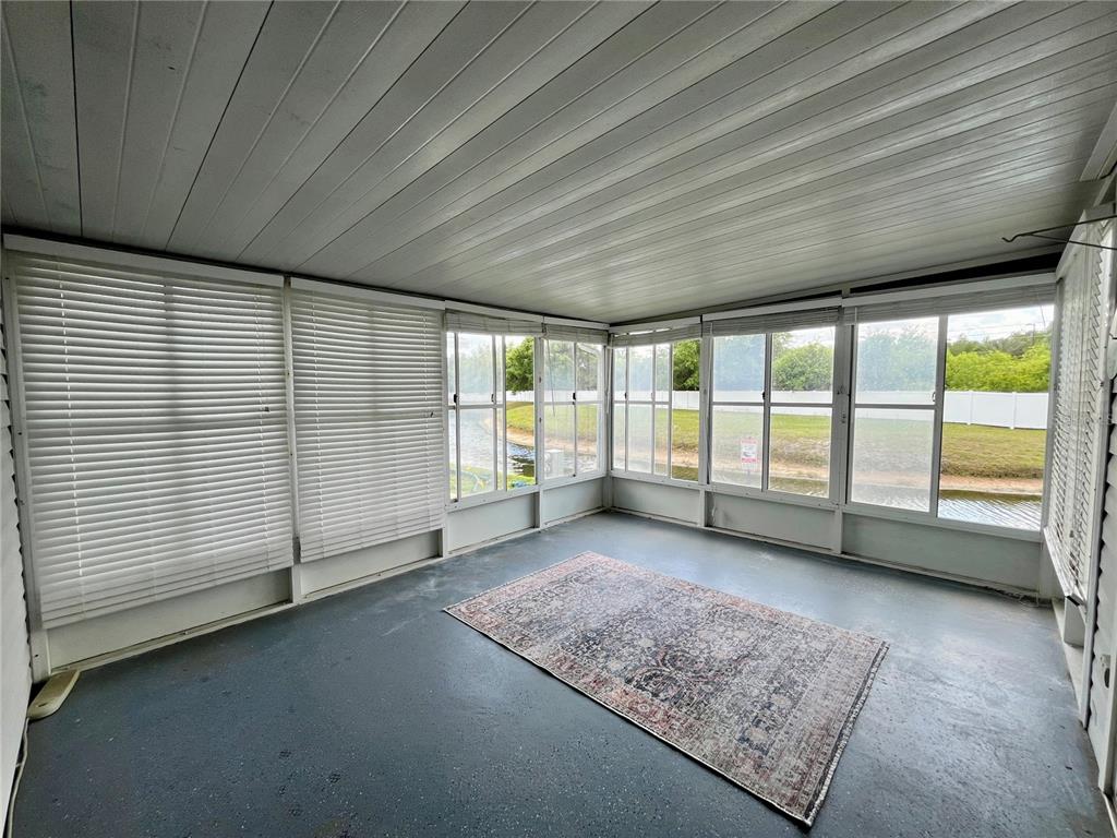 10614 Hayden Avenue New Port Richey, FL 34655 - Photo 7 of 23 an empty room with windows