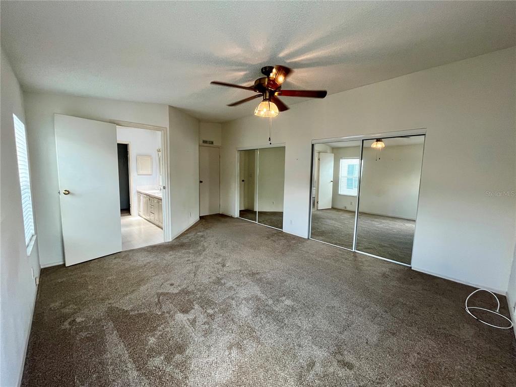10614 Hayden Avenue New Port Richey, FL 34655 - Photo 9 of 23 wooden floor in an empty room