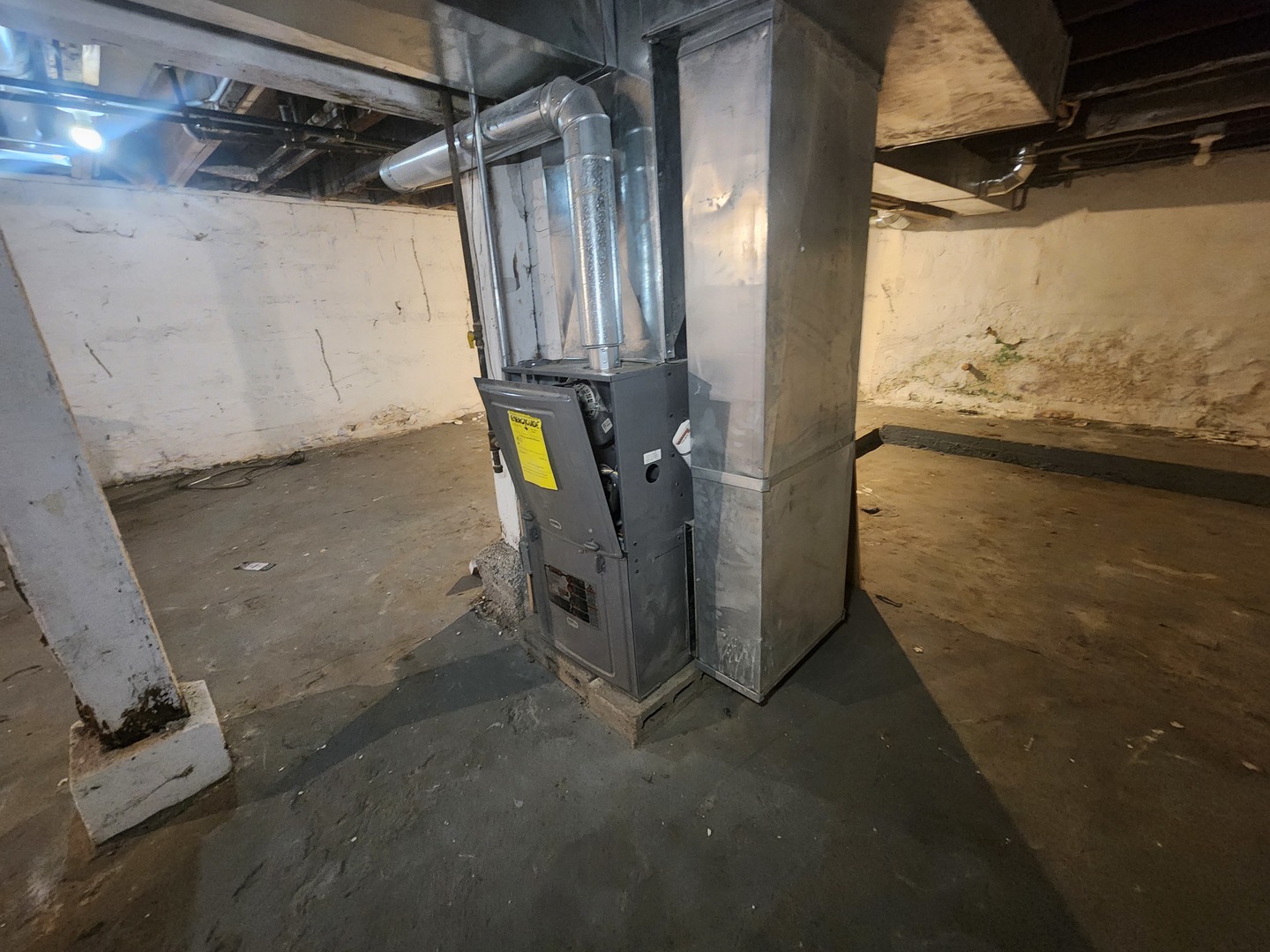 12211 South Wallace Street Chicago, IL 60628 - Photo 17 of 17 a view of storage and utility room
